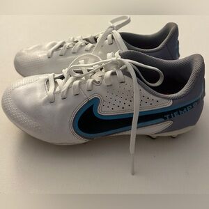 Nike girl’s Tiempo Legend 9 Academy MG
Multi-Ground Soccer Cleats.  Size 2.5T.